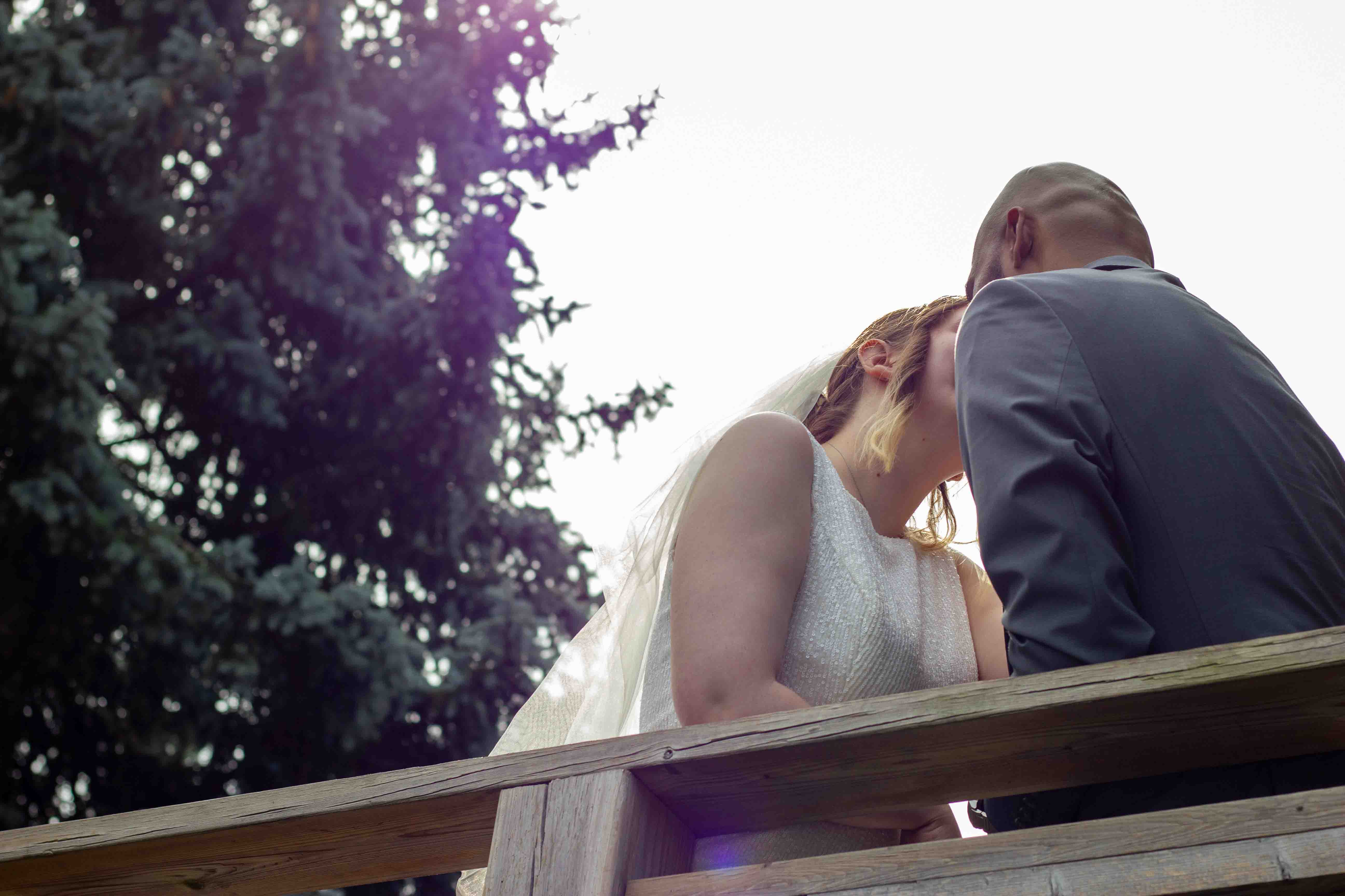 Candid wedding photography of a couple sharing a joyful moment in Toronto, Ontario